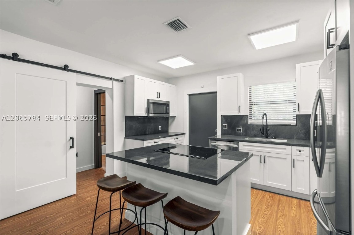 1121 NW 57th, Miami, FL, 33127 - Investment Single Family Home. Photo #1